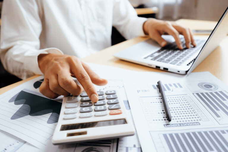 Close-up of financial charts and tax data on a computer screen