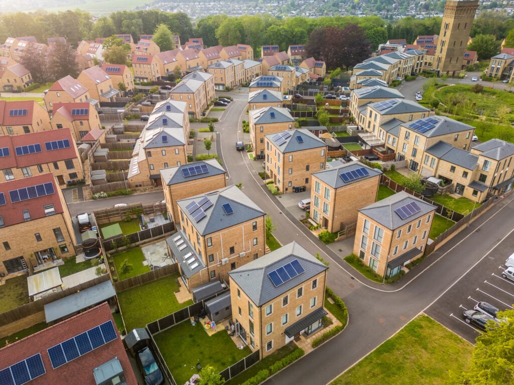 Aerial drone view of the Cane Hill area in Coulsdon, UK, with new houses and apartments.