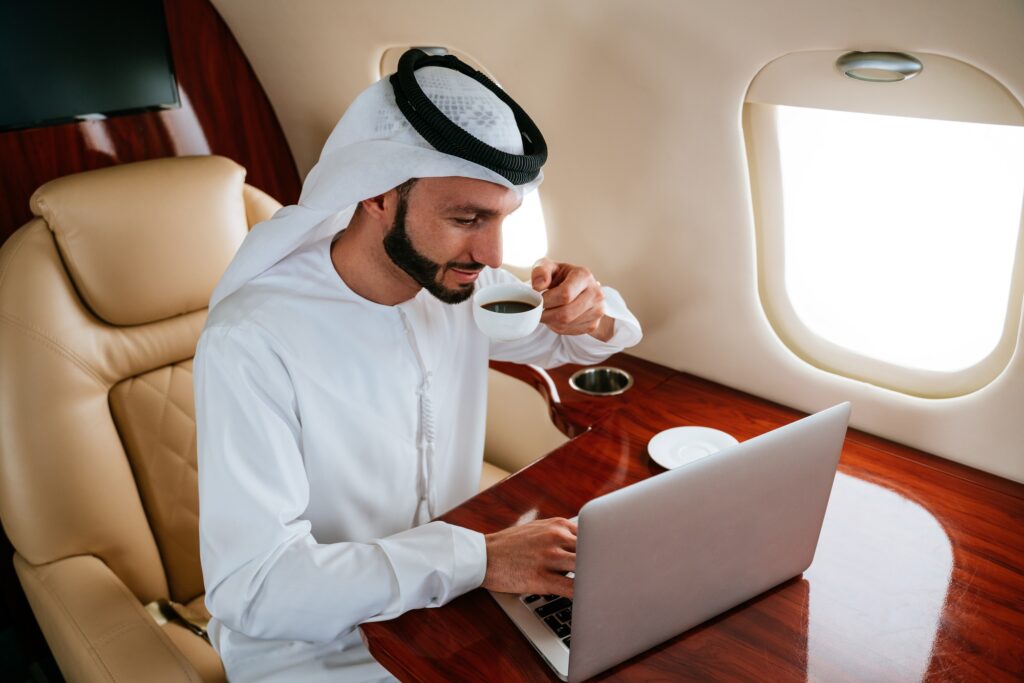 Business man flying on private jet